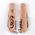 Ніж Victorinox Spartan Zodiac 91мм,12функ ,Дерев'яний дракон